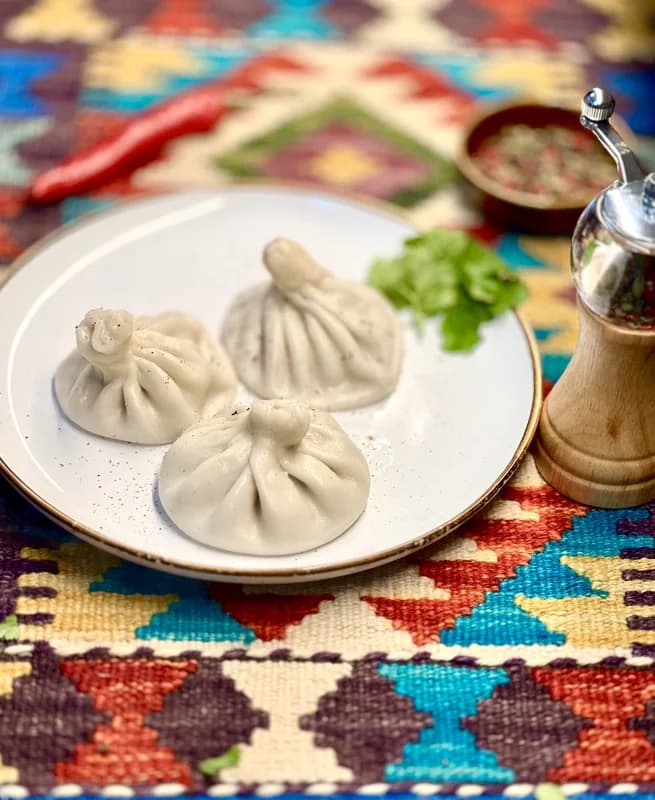 Khinkali — traditional Georgian dish filled with juicy meat and hot broth inside